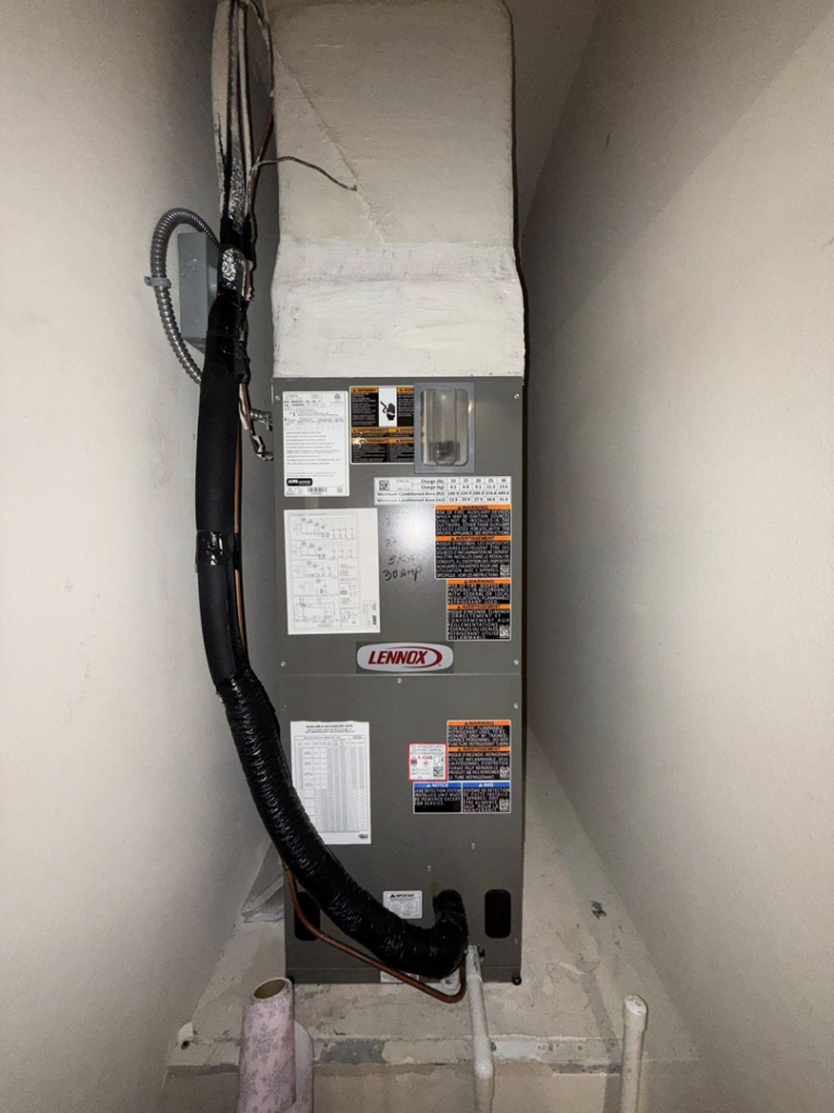 An indoor Lennox air handler unit installed by NextGen Aire of Southwest Florida in Punta Gorda, FL.