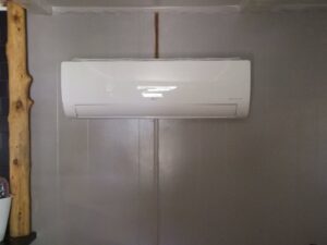 An indoor LG mini-split head unit mounted on a wall, installed by TAG Heat N Air in North Little Rock, AR.