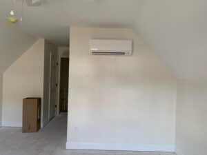 An indoor mini-split AC unit mounted on a wall, installed by Air Energy Solutions in North Chesterfield, VA