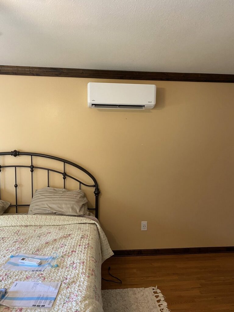 An indoor mini-split air conditioning unit installed in a bedroom by Climate Solutions. Inc. in Cape Coral, FL.