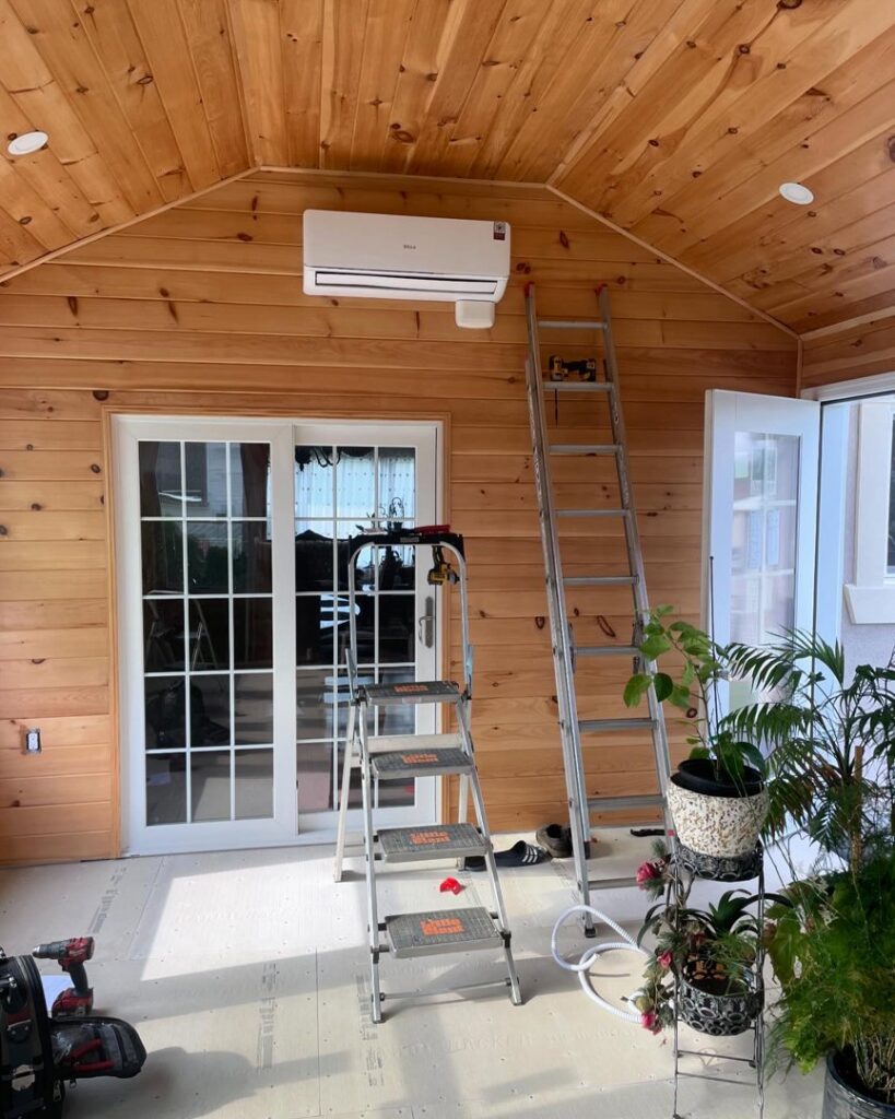 An indoor mini-split AC unit installed on a wooden wall, indicating recent HVAC work by Alpine Pro Solutions in Allentown, PA.