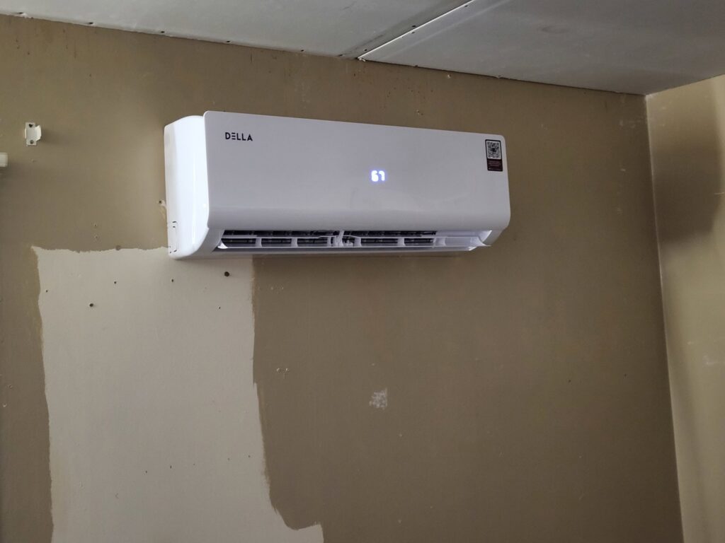 An indoor mini-split air conditioning unit installed on a wall by Chapman HVAC in Cleveland, OK.