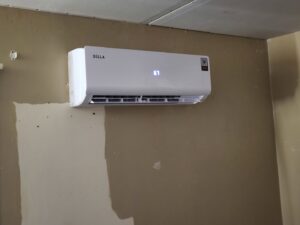 An indoor mini-split air conditioning unit installed on a wall by Chapman HVAC in Cleveland, OK.