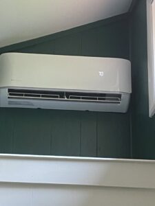 An indoor mini-split AC unit mounted on a wall, installed by Kane Heating & Air in Mountain Top, PA.