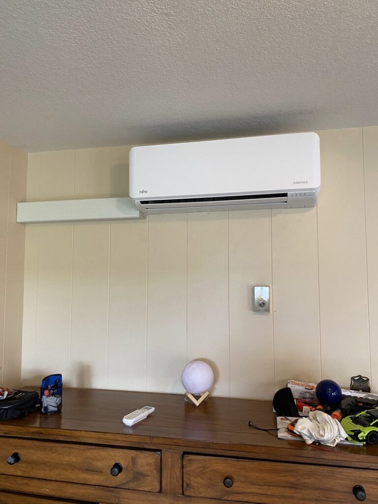 An indoor mini-split air conditioning unit installed in a living room by Climate Solutions. Inc. in Cape Coral, FL.