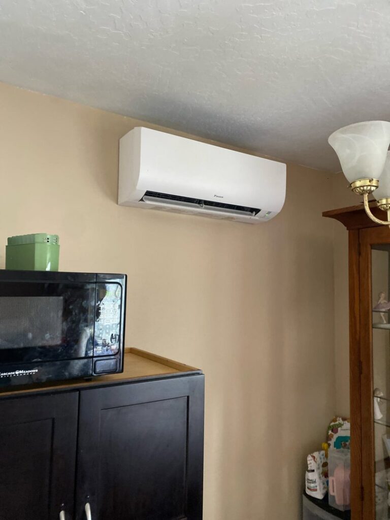 An indoor mini-split head unit installed on a wall by Alpine Heating in Eugene, OR.