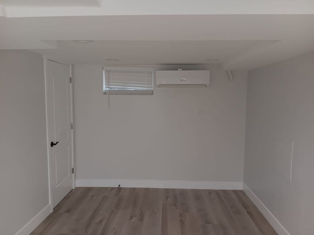 An indoor mini-split head unit installed on a wall in a room by LUCAS Heating And Air LLC in Salt Lake City, UT.