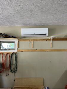 An indoor mini-split head unit installed on a wall by Millard Heating & Cooling in Elkhorn, NE.