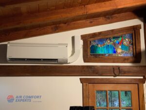 An indoor mini-split HVAC unit installed on a wall by Air Comfort Experts in Pasadena, CA.