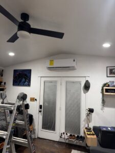 An indoor mini-split HVAC unit installed above a door by Cutting Edge HVAC LLC in Orem, UT.