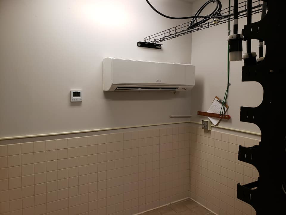 An indoor wall-mounted Mitsubishi Electric mini-split HVAC unit installed by J.M Heating, Air Conditioning and Refrigeration in Pittsburgh, PA.