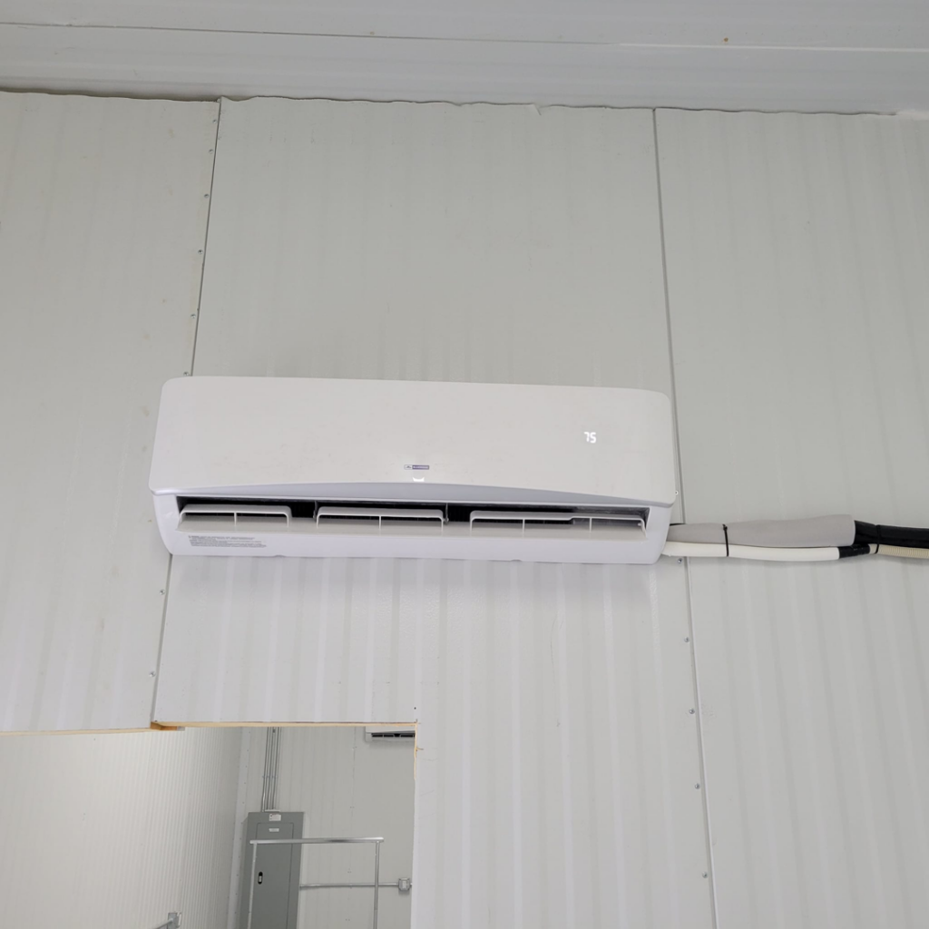 An indoor mini-split HVAC unit installed on a wall by Lifeline Heating and Cooling in Livonia, MI.