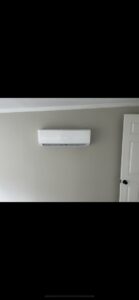 A clean indoor mini-split HVAC unit mounted on a wall, installed by Air Advisors of Louisiana in Shreveport, LA.