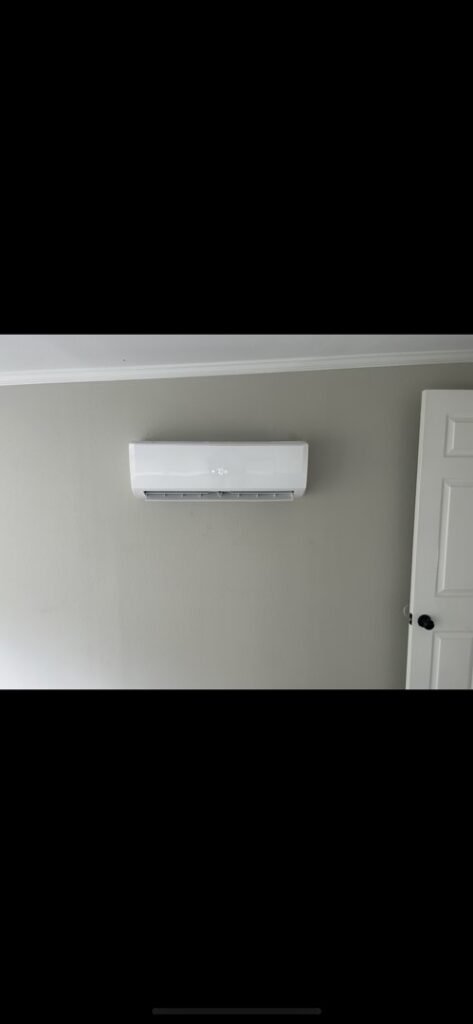 A clean indoor mini-split HVAC unit mounted on a wall, installed by Air Advisors of Louisiana in Shreveport, LA.