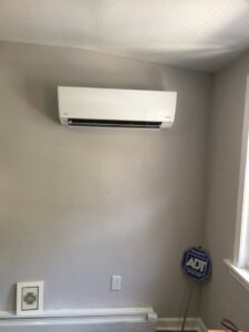 An indoor Fujitsu mini-split unit professionally installed on a wall by Green Air Heating&Cooling in Philadelphia, PA.