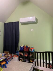 An indoor mini-split heat pump unit installed in a child's room by Champlain Valley Heat Pump, LLC in Colchester, VT.