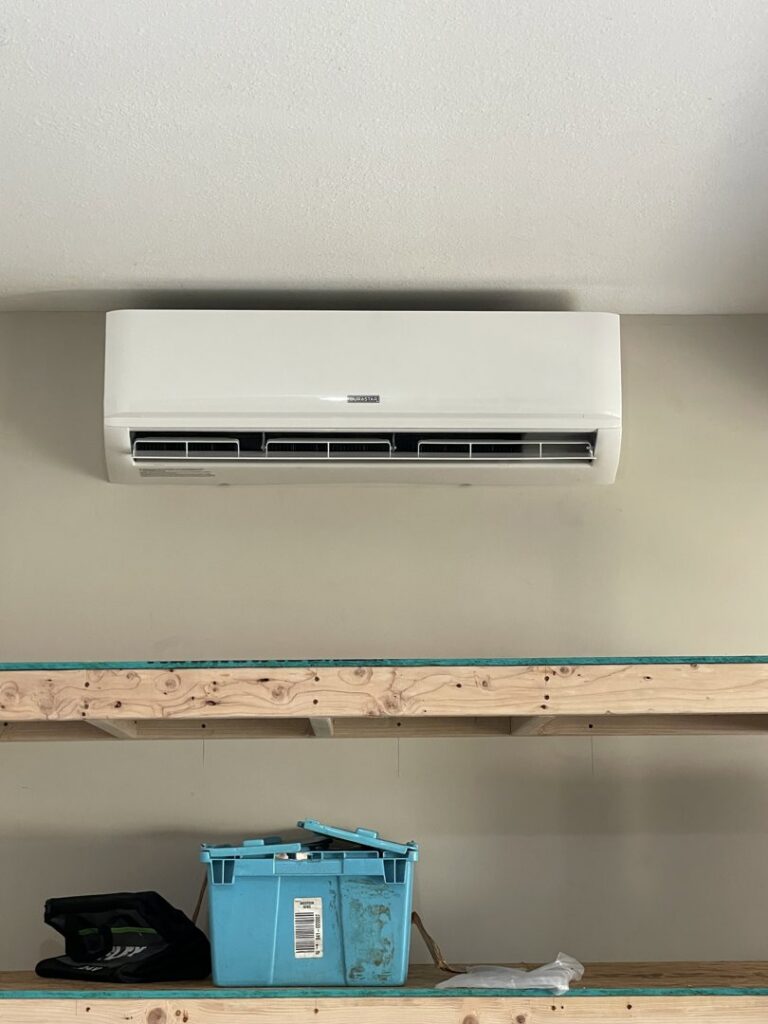 An indoor mini-split air conditioning unit mounted on a wall by Elite Home Comfort in Clarksville, TN