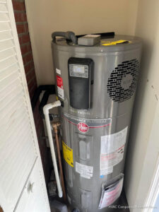 An indoor tank water heater installed in a utility closet by Cannon Heating and Air Conditioning, LLC in Newport News, VA.