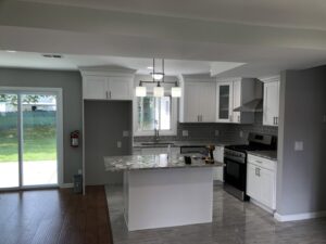 Industrial battery chargers installed on a warehouse wall by Cardinal Electric in Sayreville, NJ