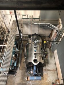 An industrial boiler and heating system with complex piping, installed by R.J. O'Neil Inc. in Montgomery, IL.