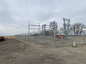An industrial chain-link fence project with barbed wire completed by Big Red Fencing LLC in Waverly, NE.