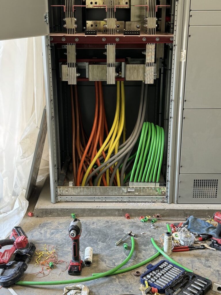 Industrial electrical cabinet with heavy-gauge colored wiring during installation by TF Electrical Solutions in Omaha, NE.