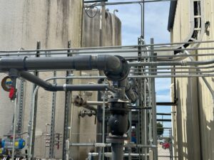 Industrial electrical conduit installation on large tanks and piping by Trizone Electric, LLC in Houston, TX.