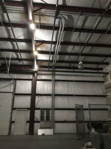 Industrial electrical conduit and lighting installed by Parks Electric & Mechanical Co. in Newport News, VA.