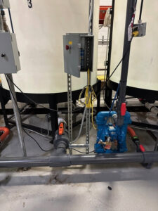 An industrial electrical control panel with wiring and components, installed by High Electrical in Atlanta, GA.