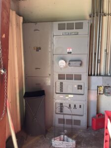 Large industrial electrical panels and switchgear, demonstrating commercial electrical services by Ernco Electric Inc. in Fresno, CA.