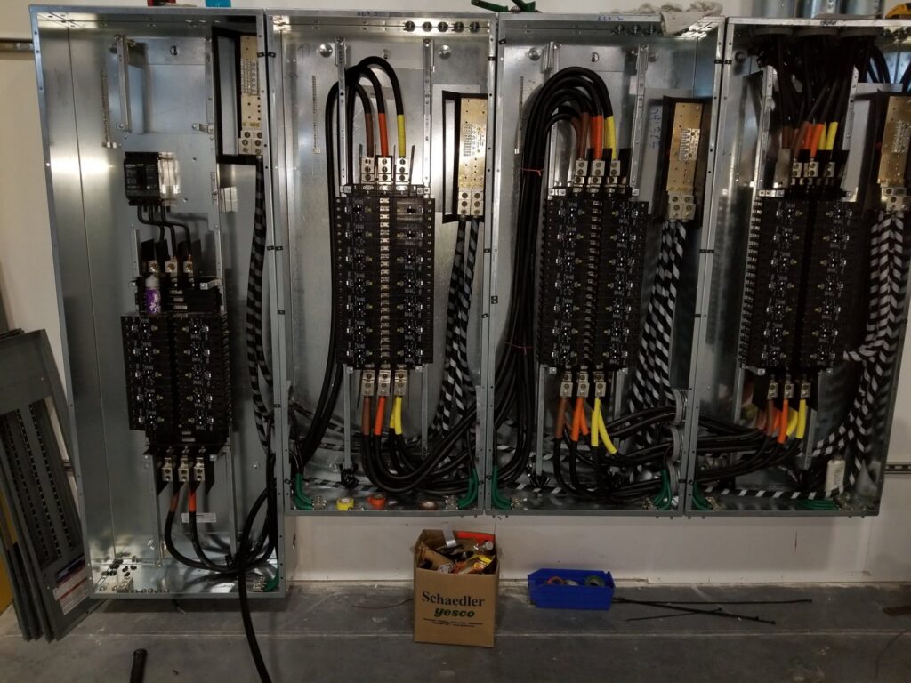 Large industrial electrical switchgear and panels with extensive wiring, installed by York Electrical Services in York, PA.