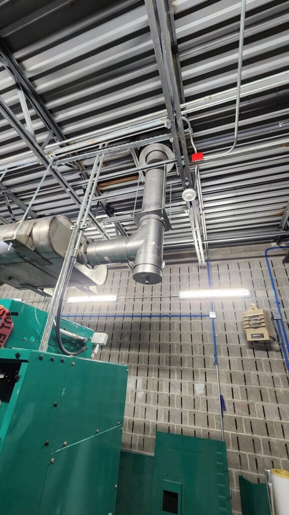 Large industrial exhaust and ventilation system piping installed by Clean Air Quality Service Inc in Hawthorne, NY