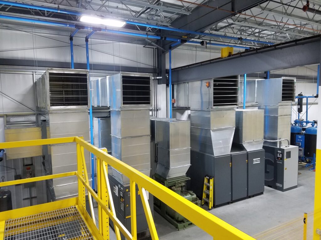 Large industrial HVAC air handling units and ductwork installed by Advantage Mechanical, Inc. in Appleton, WI.