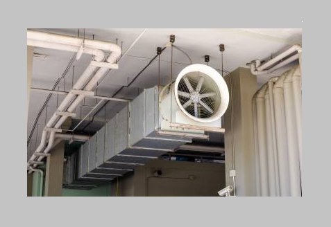 Industrial HVAC ductwork and a large ventilation fan, typical of projects handled by Applied Mechanical Solutions in Hazelwood, MO.