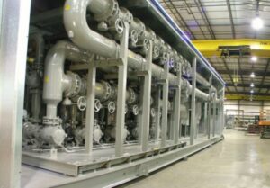 A complex industrial HVAC piping system with numerous valves, installed by Stillwell-Hansen Inc. in Edison, NJ.