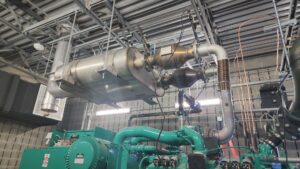 An industrial HVAC and ventilation system with large pipes and machinery installed by Clean Air Quality Service Inc in Hawthorne, NY