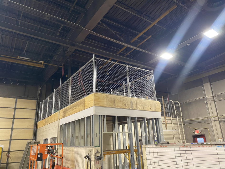 An industrial interior chain-link fence installed for safety by Big Red Fencing LLC in Waverly, NE.