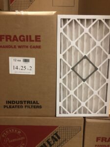 A close-up of an industrial pleated HVAC filter and its packaging from Murray Filter Sales and Service, Inc. in Nashville, TN