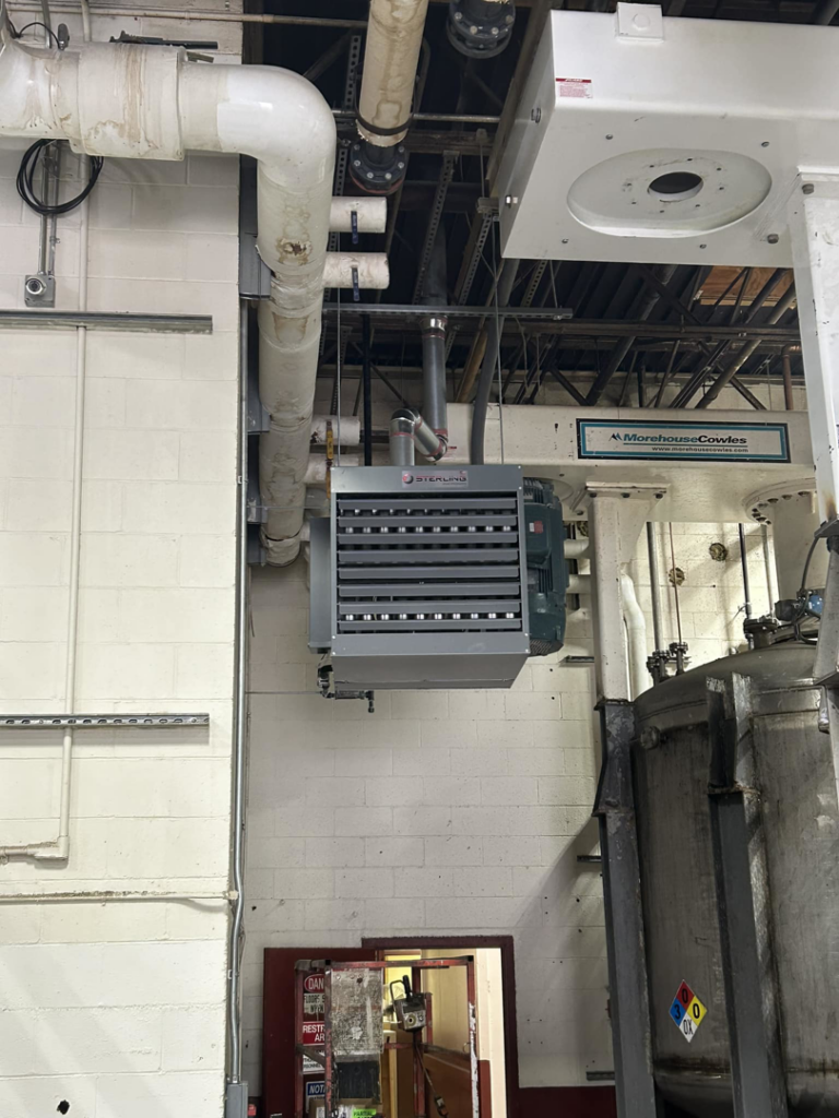 An industrial unit heater installed in a commercial space by Foremost Mechanical Services in Hartford, CT.