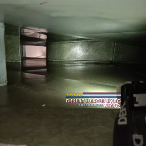 An interior view of HVAC ductwork or air handler during an inspection by Desert Heroes HVAC in Phoenix, AZ