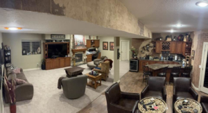 A spacious finished basement living area with newly installed light-colored carpet by Home Dynamics Flooring LLC in Harrisburg, SD.