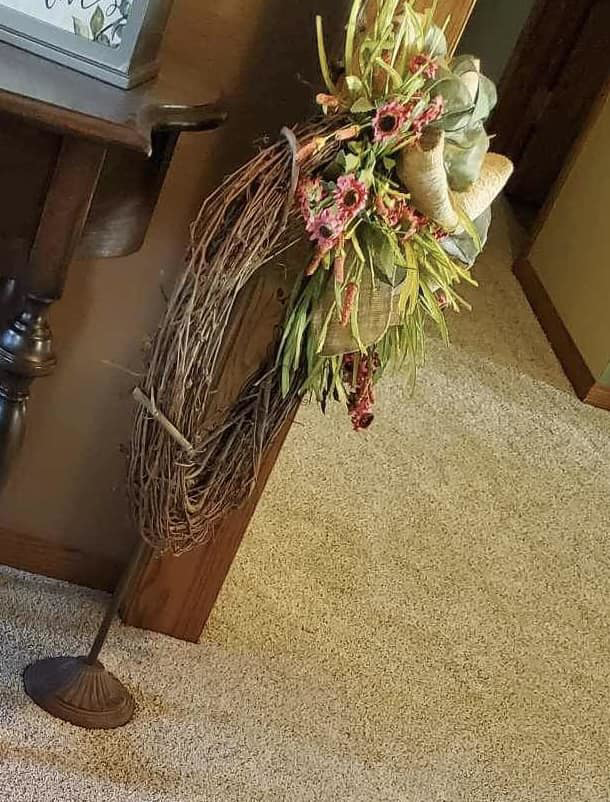 Installed carpet in a home setting with decorative elements, provided by Carpet Center Huron SD in Huron, SD.