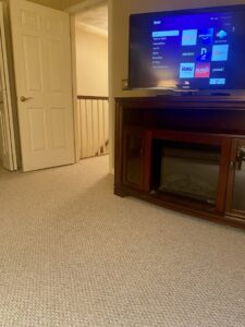 Newly installed wall-to-wall carpet in a living room by FCO Carpet Remnant STORE in Pawtucket, RI.