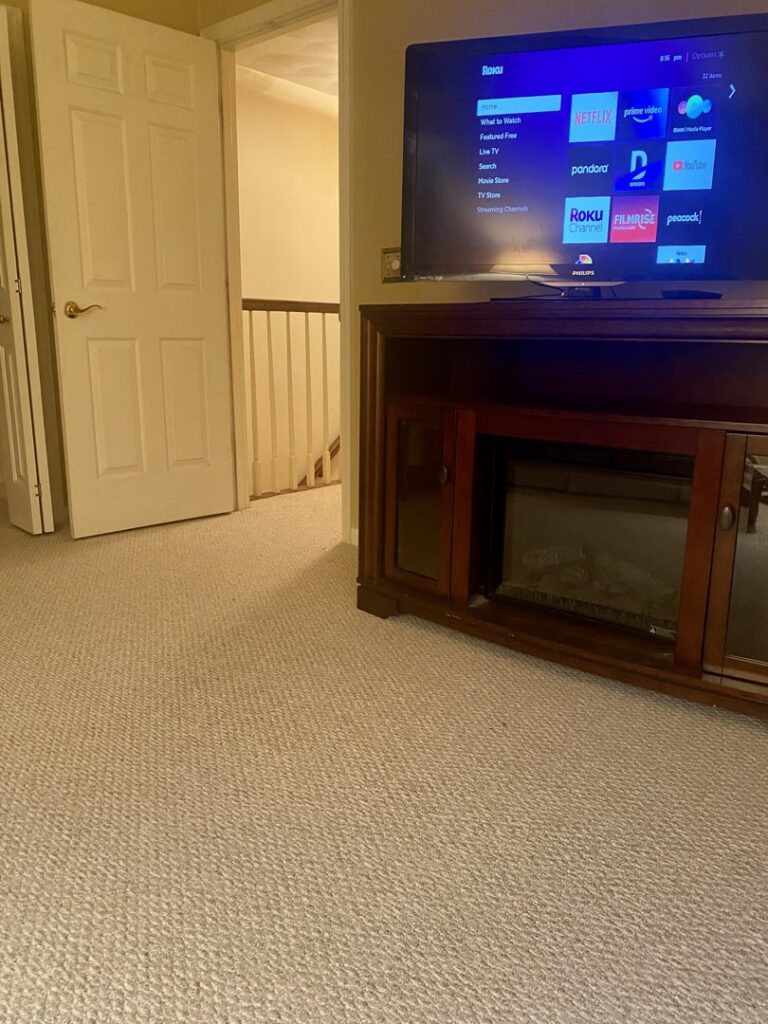 Newly installed wall-to-wall carpet in a living room by FCO Carpet Remnant STORE in Pawtucket, RI.