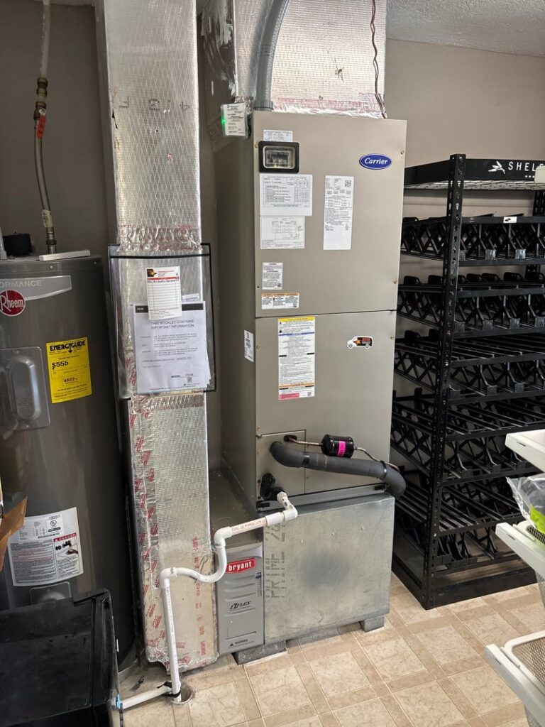 A newly installed Carrier furnace and air handler by STAR Heating Cooling Plumbing in Fishers, IN.