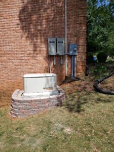 An installed Generac generator with visible electrical panels by Morris Electric Co. Inc. in Louisville, KY.