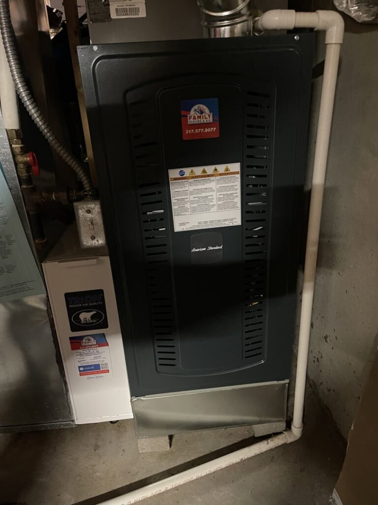 A newly installed or serviced HVAC furnace unit by Family Heating & Air Conditioning in Indianapolis, IN.