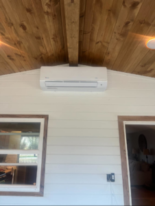 A newly installed indoor mini-split HVAC unit on a wall by Emerald Air in Wichita, KS.