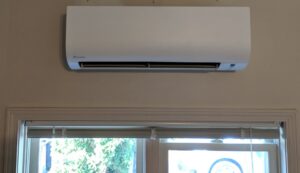 A newly installed wall-mounted mini-split indoor unit by Total Comfort Heat and Air Conditioning, Inc. in Rochester, NY.