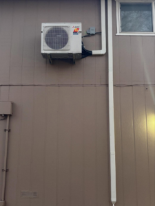 A professionally installed outdoor mini-split HVAC unit on the exterior of a home by Royal Heating & Air LLC in Sparks, NV